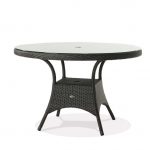 A round wicker palm harbor dining table